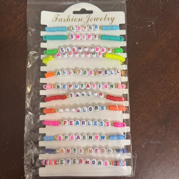 Taylor Swift Set of 12 Bracelets, New in Bag - Picture 1 of 1